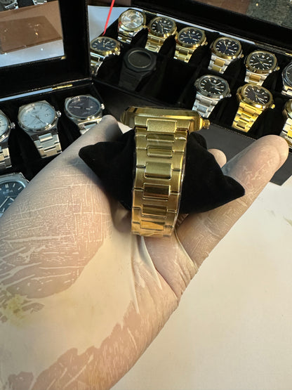 Patek philippe golden watch with black dail