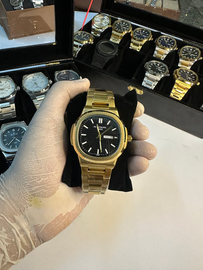 Patek philippe golden watch with black dail