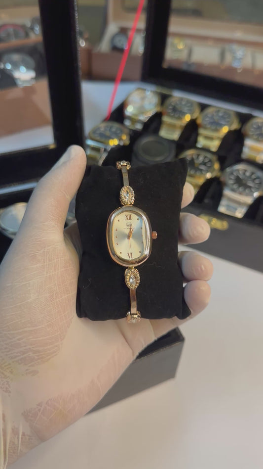 Ladies premium golden chain watch with oval dial
